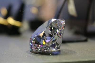 Close-up of diamond on table in jewelry store