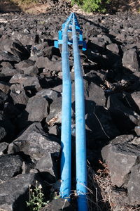 High angle view of pipe on field