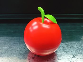 Close-up of red bell peppers on table