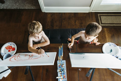 Boys and table at home