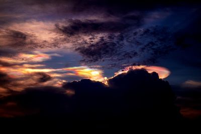 Low angle view of dramatic sky at sunset