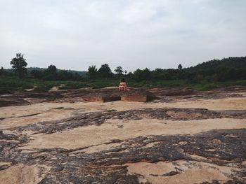 Scenic view of land against sky