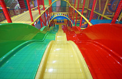 High angle view of illuminated ferris wheel in playground