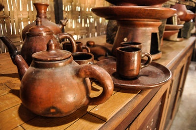 Close-up of old tea cup on table