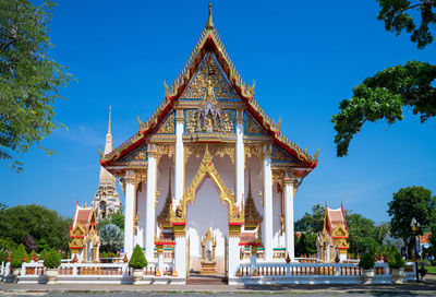 View of temple against blue sky