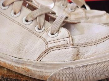 Close-up of shoes on table