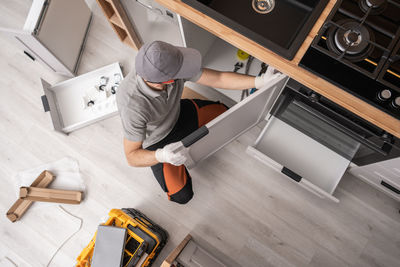 High angle view of man working at table