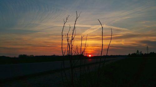 Scenic view of landscape at sunset