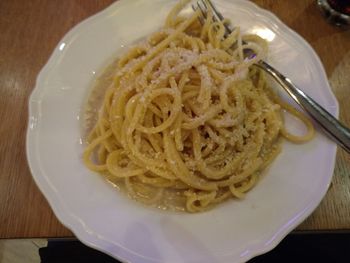 High angle view of noodles in plate on table