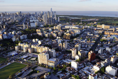 High angle view of modern buildings in city against sky