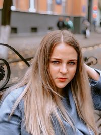 Portrait of a beautiful young woman in car