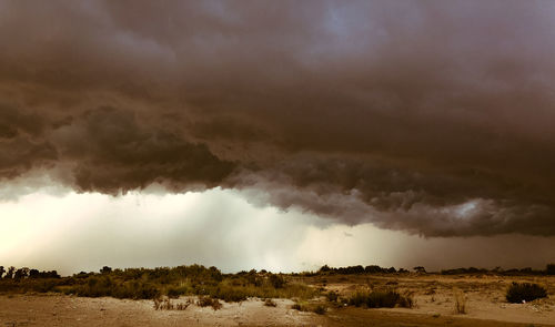 Panoramic view of storm clouds over land