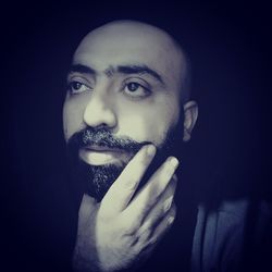 Portrait of young man smoking