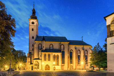 Low angle view of church against blue sky