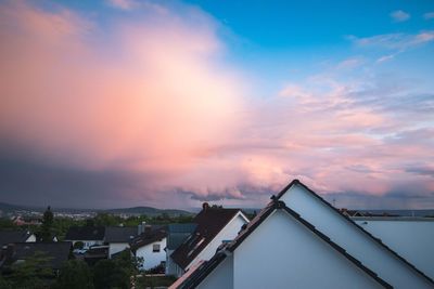 High angle view of buildings against sky during sunset