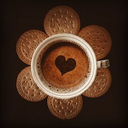 High angle view of coffee cup on table