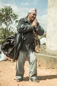 Full length of man standing in snow