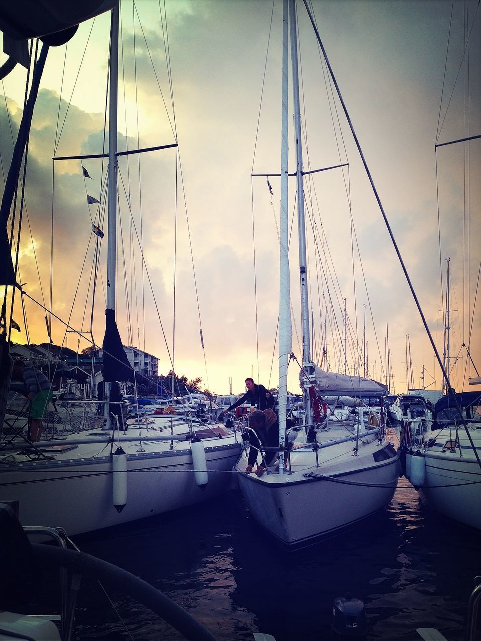 nautical vessel, water, transportation, moored, boat, mode of transport, mast, sky, harbor, sunset, sea, sailboat, reflection, waterfront, cloud - sky, nature, outdoors, built structure, no people, river