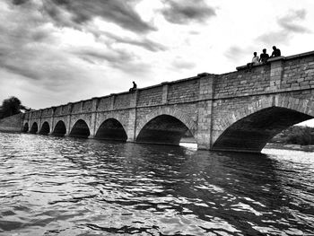 Arch bridge over river