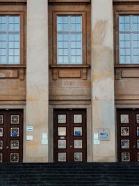 Low angle view of glass window on building