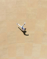 High angle view of man with umbrella