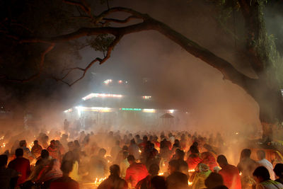 High angle view of crowd at temple at night