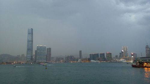 City lit up at waterfront