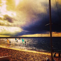 Scenic view of sea against cloudy sky