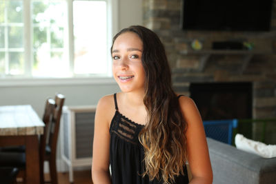 Portrait of smiling young woman