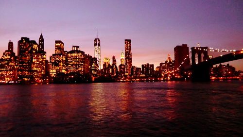 Illuminated buildings in city at night