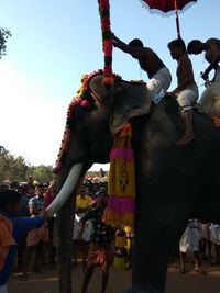 Low angle view of elephant statue against sky