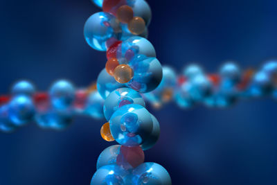 Close-up of molecular structure against blue background