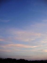 Scenic view of landscape against cloudy sky