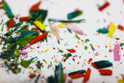 High angle view of multi colored candies on table