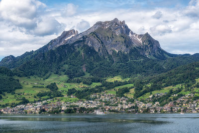 The view of mount pilatus mountain tops while on a boat cruise in lake lucerne. taken in luzern