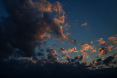 Low angle view of dramatic sky during sunset