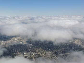 Aerial view landscape and cityscape of indianapolis through clouds. view from airplane. 