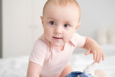 Portrait of cute baby boy at home