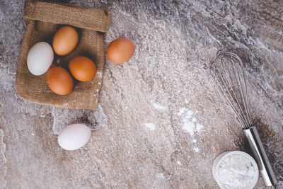 High angle view of eggs in container on table