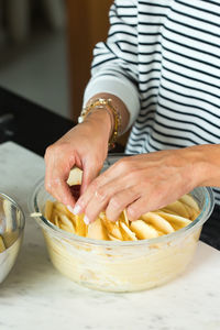 Midsection of man preparing food