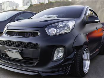 Vintage car parked in city