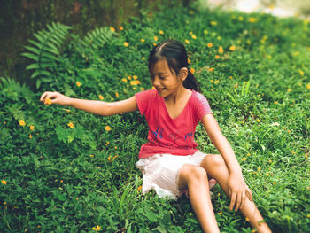 Full length of girl on field