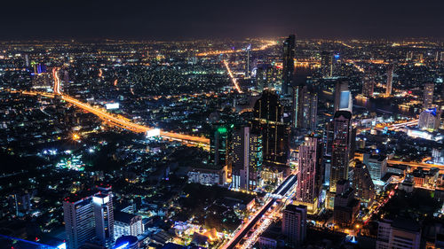 Illuminated cityscape at night