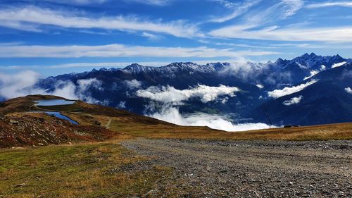 Scenic view of snowcapped mountains against sky