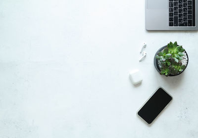 High angle view of mobile phone on table