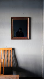 Close-up of man on window