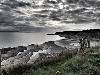 Scenic view of beach against sky