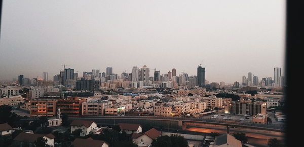 Cityscape against clear sky