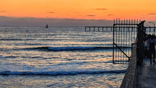 Scenic view of sea against sky during sunset