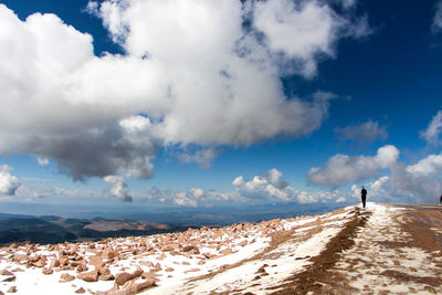 Distant man looking at majestic view in colorado city